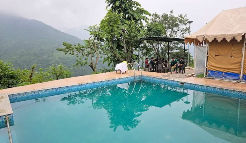 Tent house beside swimming pool